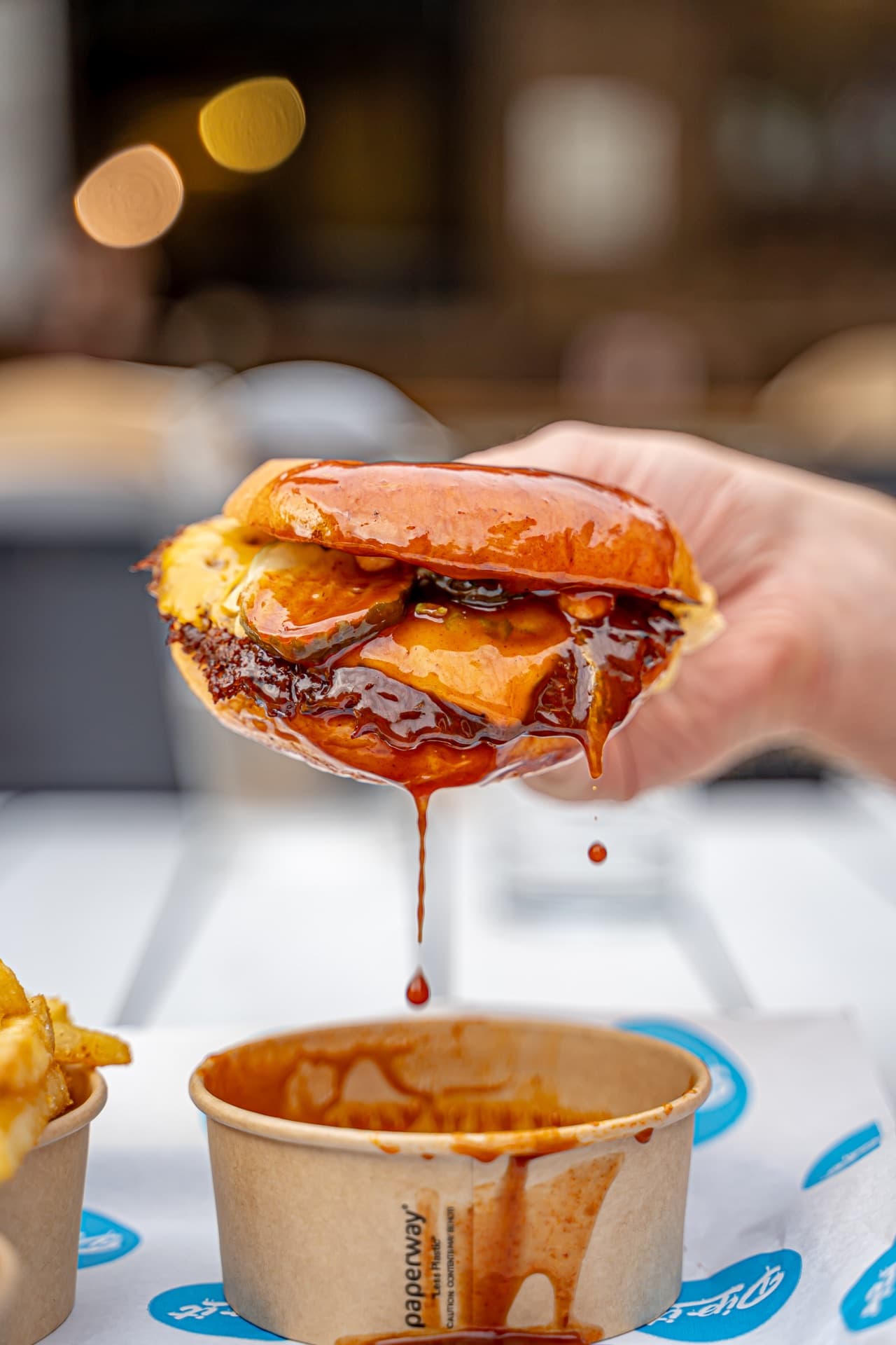 Dip It Sydney smash burger with dipping sauce — the original dippable burger experience
